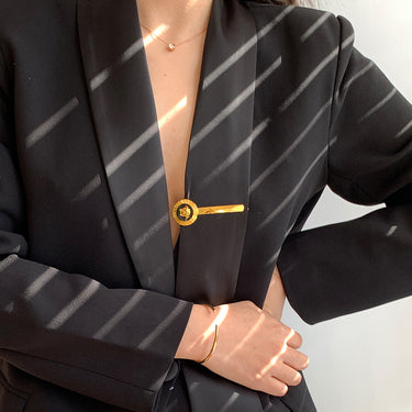 Black Blazer with Brooch and Cinched Waist